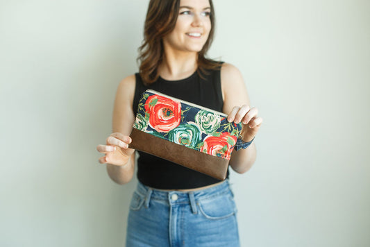 Coral and navy floral wristlet
