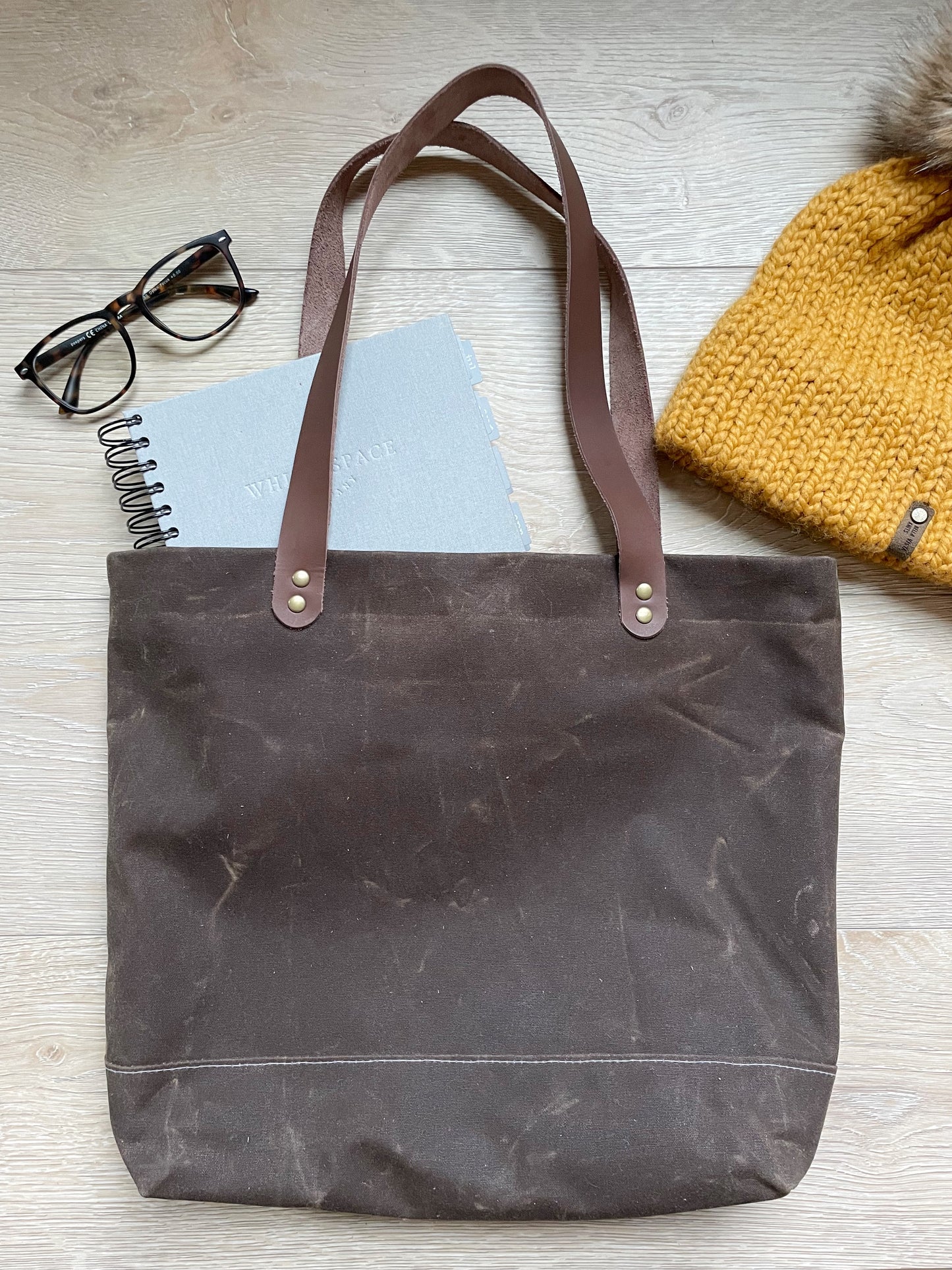 Brown waxed canvas tote bag