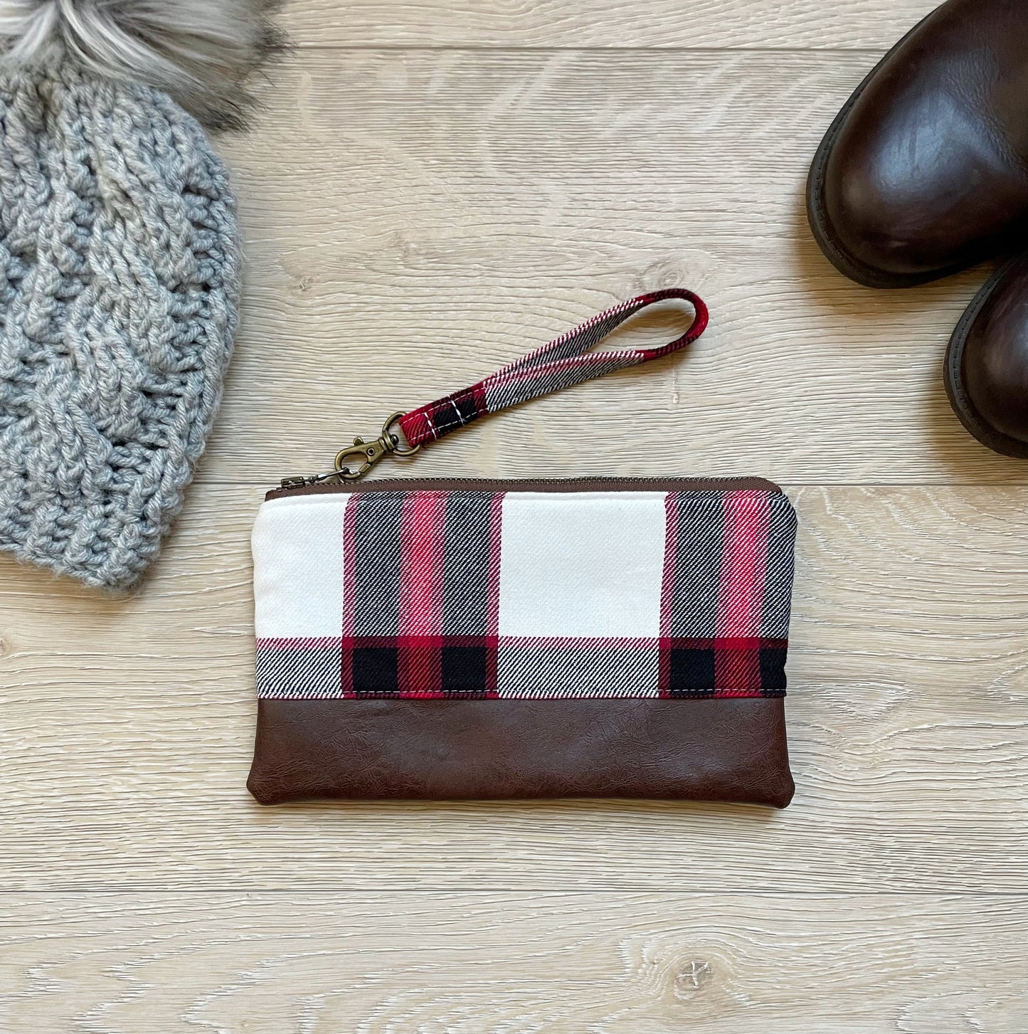 Red, black and cream plaid flannel wristlet