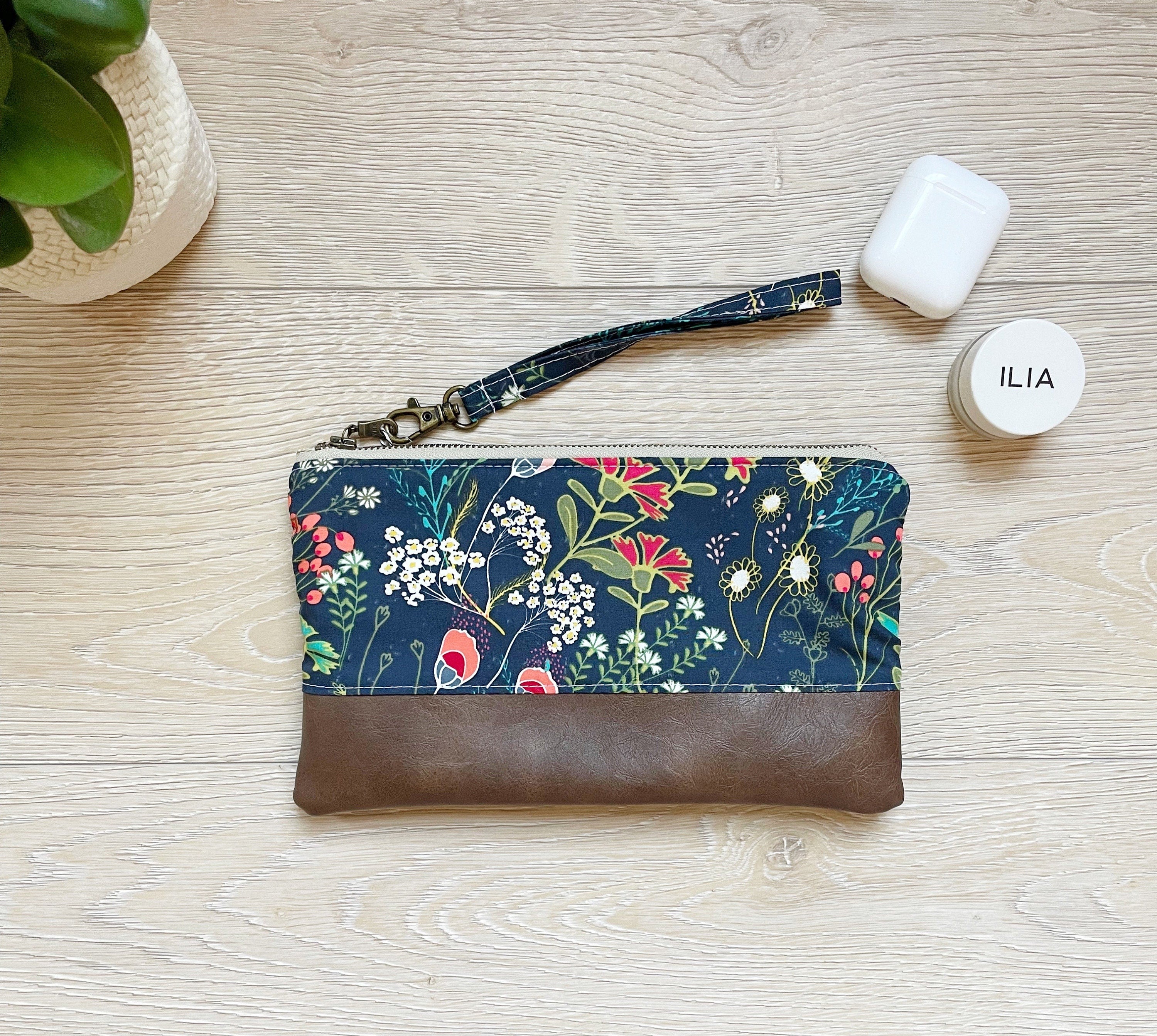 Navy floral best sale clutch bag